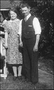 Reg & his wife in the garden
