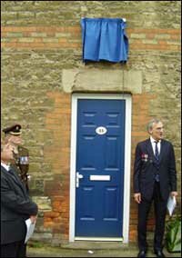 Bernard's medals worn by his grandson at the unveiling of the plaque 